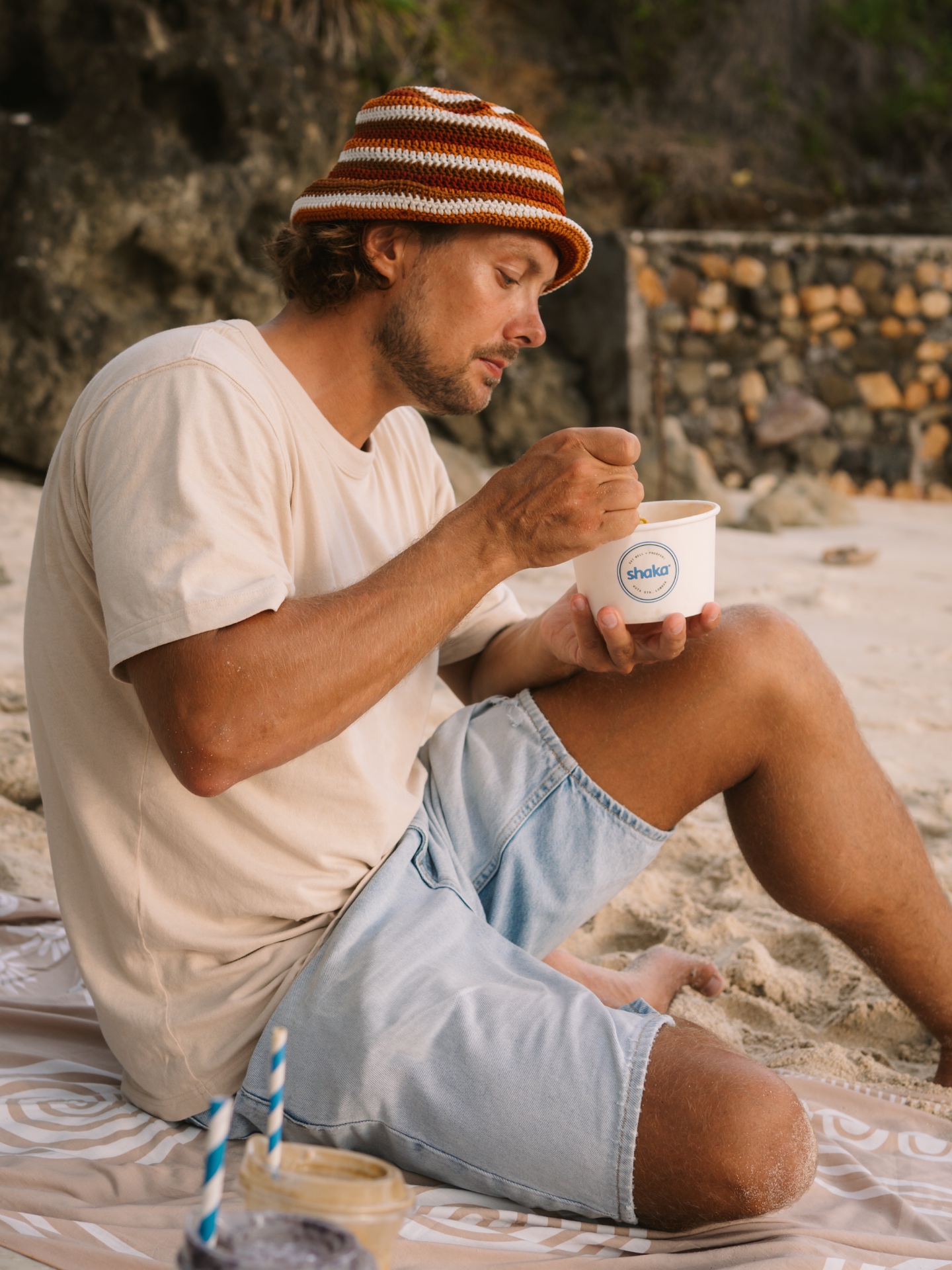 Beachside lifestyle portrait with Shaka cup