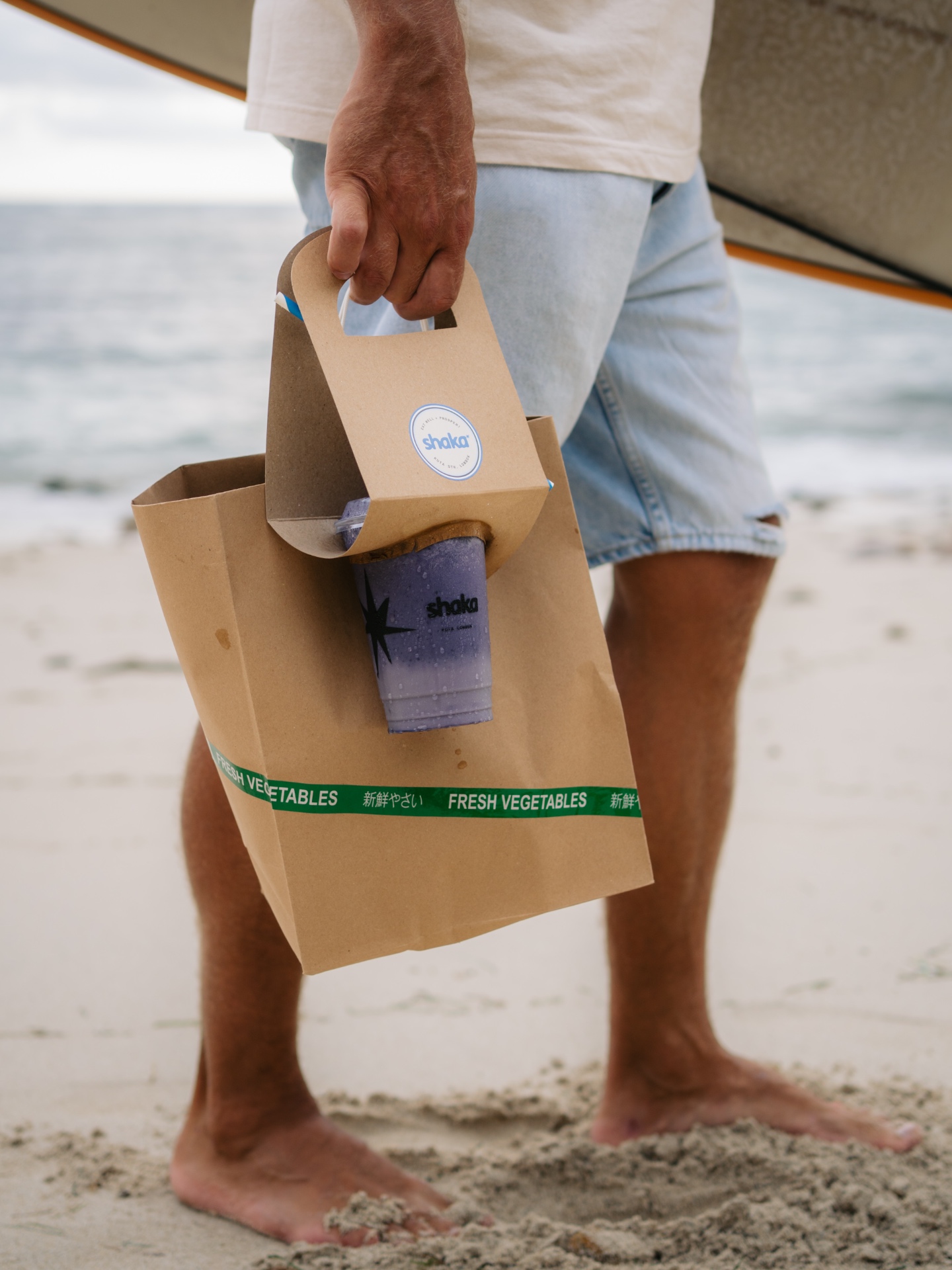 Beachside lifestyle brand content with smoothie